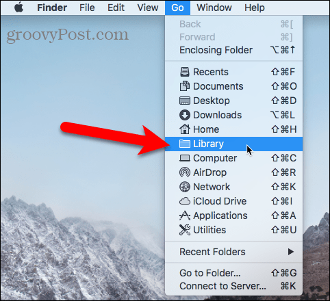 Juurdepääsuks kaustale Library saate kasutada Macis Finderi menüüd Go